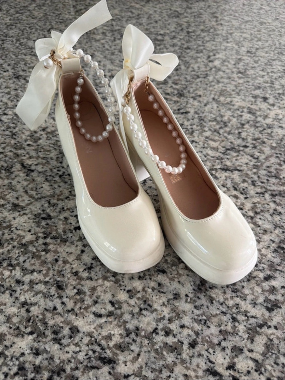 Pearl-Embellished Cream Patent Heels with Bow Ankle Strap